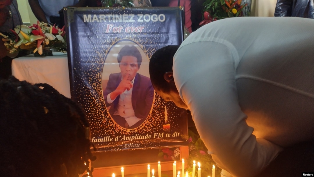 FILE - An altar honoring Martinez Zogo, who was found dead after being abducted, in Yaounde, Cameroon, Jan. 23, 2023. 