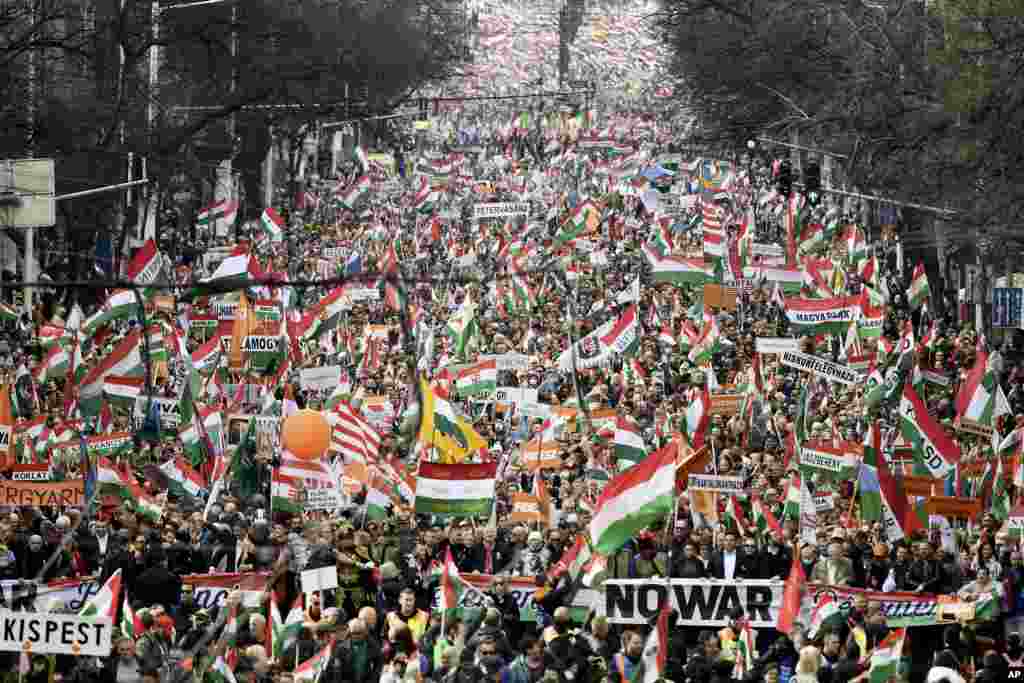 Thousands of supporters of Hungary's right-wing populist Prime Minister Viktor Orban gather in Budapest, Hungary, March 15, 2022.