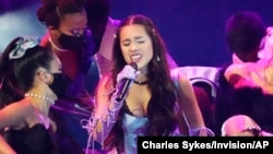 FILE - Olivia Rodrigo performs "Good 4 U" at the MTV Video Music Awards on Sept. 12, 2021, in New York. Rodrigo is nominated for seven Grammy Awards. (Photo by Charles Sykes/Invision/AP, File)