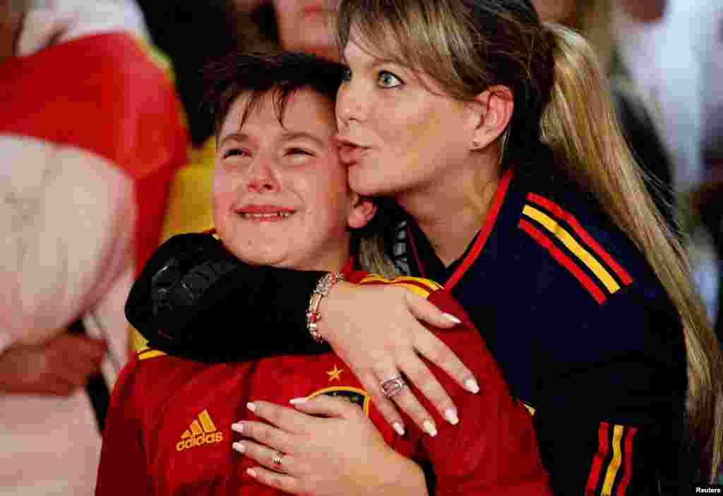 Spain fans react during the penalty shootout during 2022 FIFA World Cup football match between Morocco v Spain in Qatar as they watch the match on a big screen in Barcelona, Dec. 6, 2022.