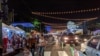 ARCHIVO. Personas caminan en una avenida en Managua, Nicaragua, el 23 de diciembre de 2021. VOA