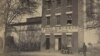 In 1861, during the U.S. Civil War, Union troops liberated the slave pen. The Union army used the pen to house Confederate prisoners. Here, a Union army guard stands at the entrance of the building, which was owned by different slave-trading firms. (National Archives) 