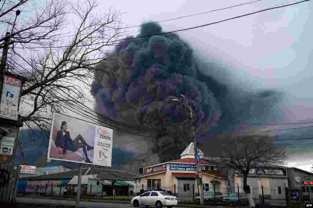 Smoke rises after an attack by Russian army in Odesa, Ukraine. Air strikes rocked Ukraine's strategic Black Sea port Odessa, according to an interior ministry official, after Kyiv had warned that Russia was trying to consolidate its troops in the south.