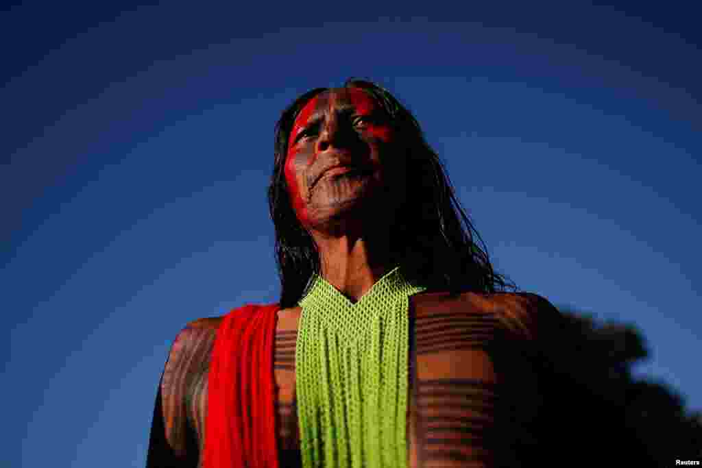 An indigenous person from the Kayapo tribe looks on during the Terra Livre (Free Land) protest-camp to defend indigenous land and cultural rights they say are threatened by the right-wing government of Brazil's President Jair Bolsonaro, in Brasilia, April 4, 2022.