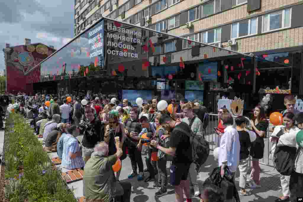 People lineup to visit a newly opened fast food restaurant in a former McDonald's outlet in Bolshaya Bronnaya Street in Moscow, Russia. Three months after McDonald’s suspended operations in Russia, hundreds of people streamed into its famous former outlet on Moscow’s Pushkin Square as the restaurant reopened under a Russian owner and a new name.
