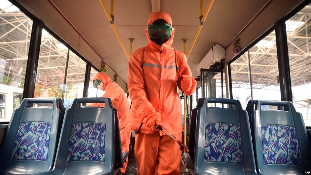 Health officials of the Ryonmot Trolley Bus Office disinfect a trolley bus, as part of preventative measures against the Covid-19 coronavirus in Pyongyang, North Korea, June 9, 2022.