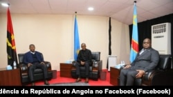 Presidentes João Lourenço, de Angola (esq), Paul Kagame, do Ruanda (cen) e Felix Tshisekedi, da RDC