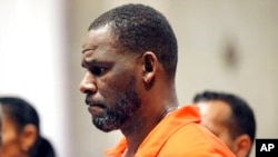 FILE - R. Kelly appears during a hearing at the Leighton Criminal Courthouse in Chicago, Sept. 17, 2019. 