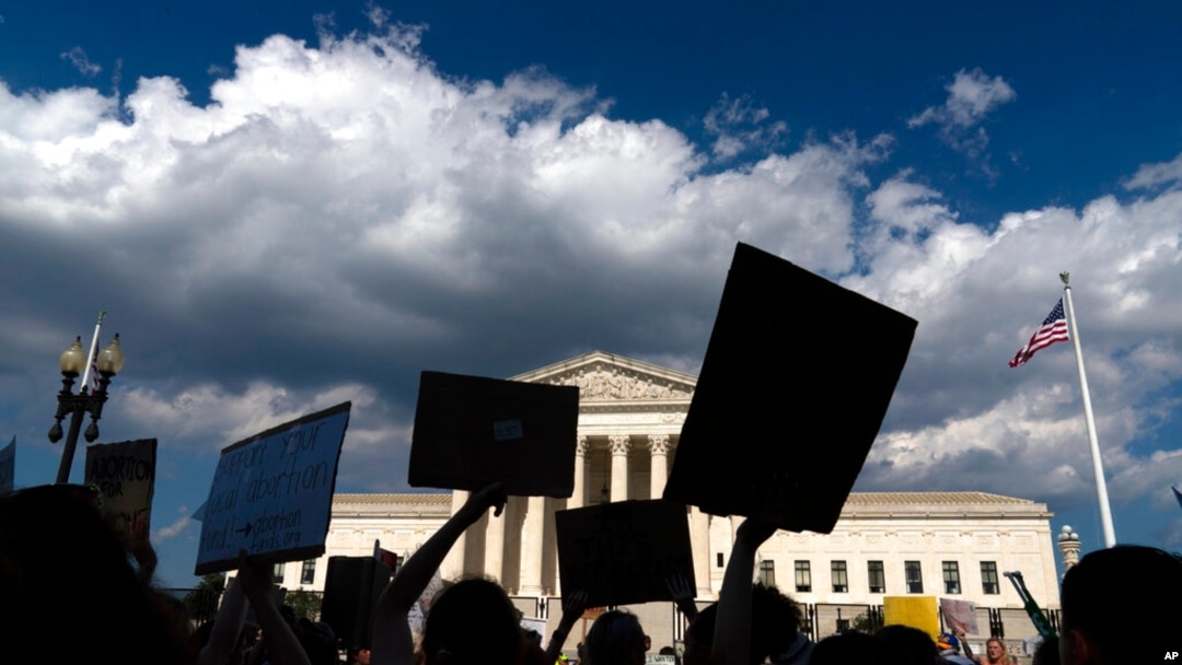 Abortion-rights activists protest outside the Supreme Court in Washington, June 25, 2022.