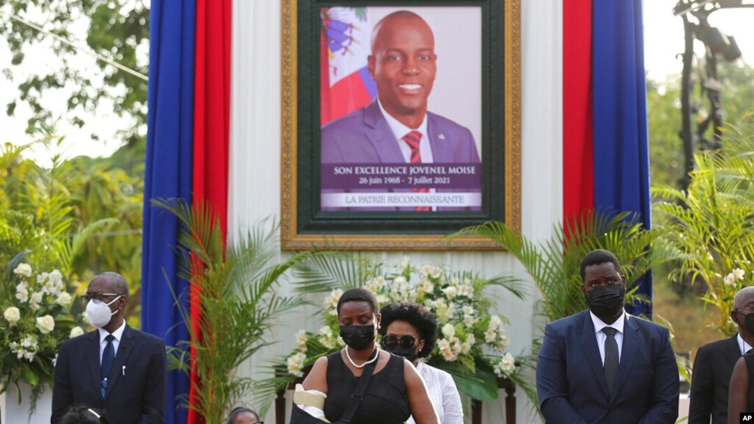 FILE - First lady Martine Moise, center, attends a memorial service for her late husband President Jovenel Moise, at the National Pantheon Museum, in Port-au-Prince, Haiti, July 21, 2021.