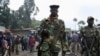 ፋይል - የኤም 23 ተዋጊዎች በዲሞክራቲክ ሪፐብሊክ ኮንጎ በስተምስራቅ በምትገኘው ሰሜን ኪቩ ዋና ከተማ ከሆነችው ጎማ በስተምዕራብ 62 ኪሎሜትር ርቀት ላይ በምትገኘው ካሩባ ከተማ ሲዘዋወሩ። 