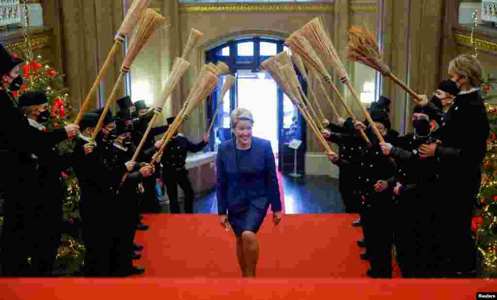 New Mayor of Berlin Franziska Giffey is welcomed by chimney sweeps as she arrives at the Town Hall, in Berlin, Germany.