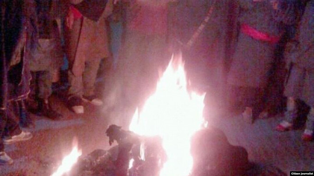 The 23-year-old Tibetan man, Tsepak Kyap, is seen here engulfed in flames near a bus stop in the township of Sankok, Sangchu county, in China’s northwestern Gansu province. This photo was sent into to the VOA Tibetan Service.