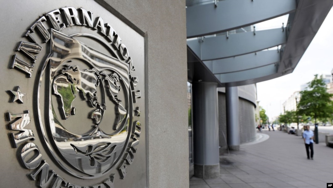 International Monetary Fund logo is seen outside the headquarters building during the IMF/World Bank spring meeting in Washington, U.S., April 20, 2018. REUTERS/Yuri Gripas - RC13CB8CD000