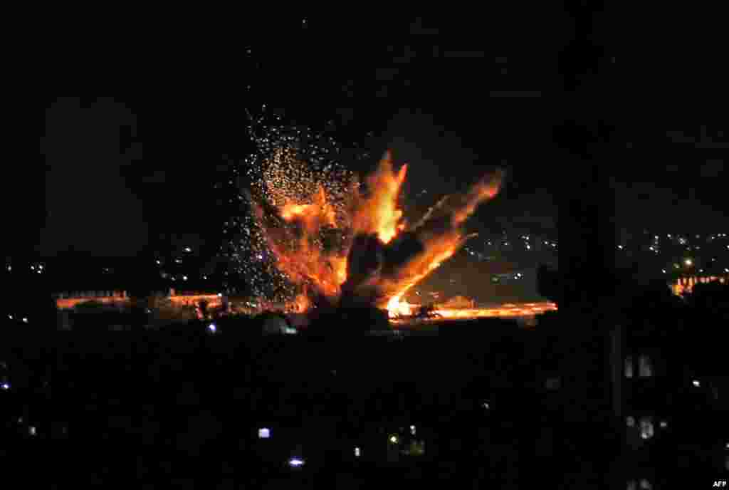 Fire and smoke billow following Israeli airstrikes targeting Rafah in the southern Gaza Strip, near the border with Egypt. Israel's military said it was carrying out airstrikes "throughout the Gaza Strip" after a barrage of rocket fire from the Palestinian enclave towards its territory.