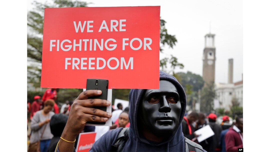 Kenyan activists and civil society groups protest in solidarity with Ugandan pop star-turned-lawmaker Kyagulanyi Ssentamu, also known as Bobi Wine, in a march to the Ugandan embassy in Nairobi, Kenya, Aug. 23, 2018.