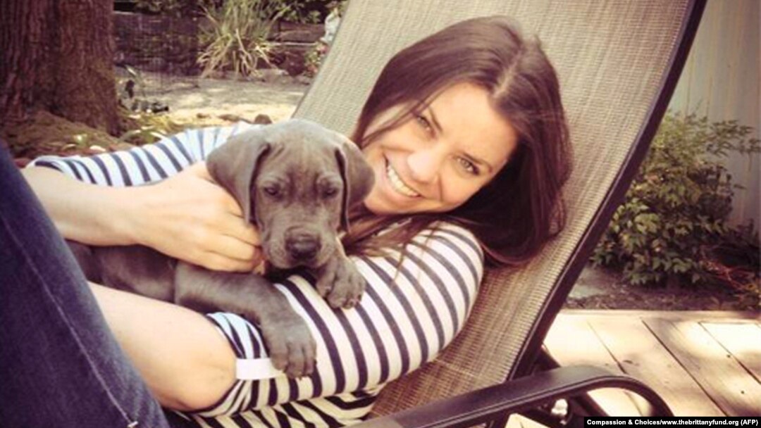 FILE - Brittany Maynard, shown with her Great Dane puppy, Charlie, took a lethal dose of medication prescribed by a doctor in Oregon on Saturday. Maynard was battling brain cancer.