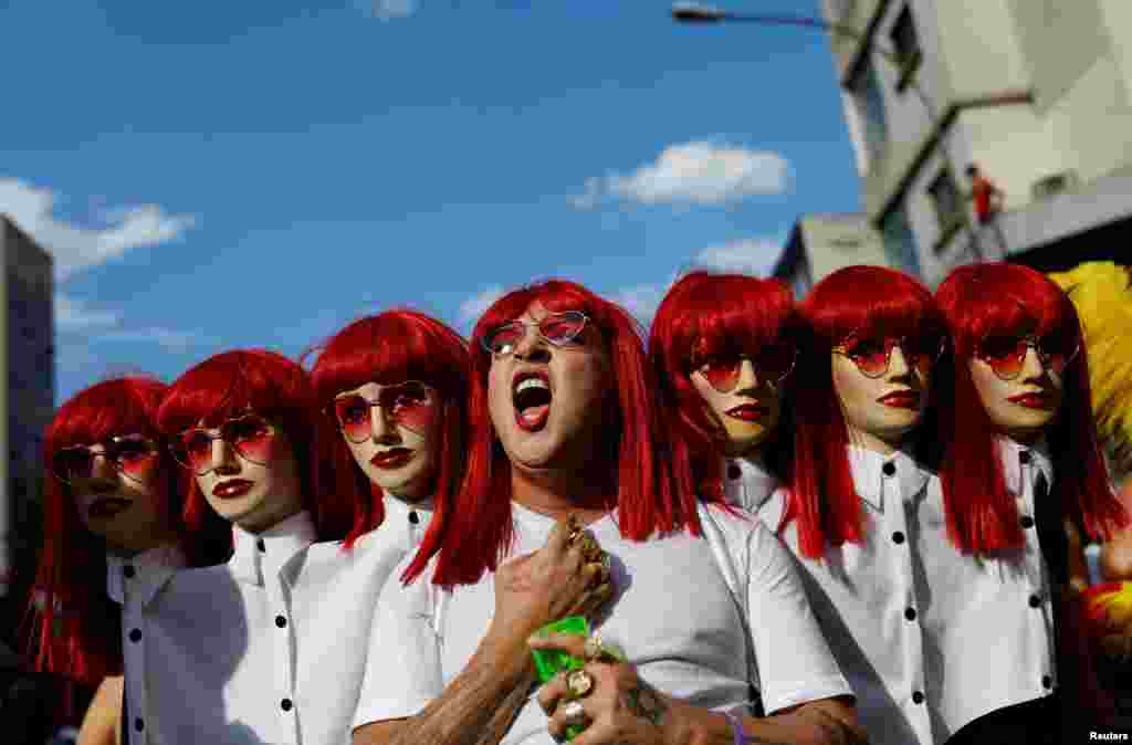 A reveler takes part in an annual block party known as "Academicos do Baixa Augusta" (Academics of Baixa Augusta neighbourhood ), during carnival festivities in Sao Paulo, Brazil.
