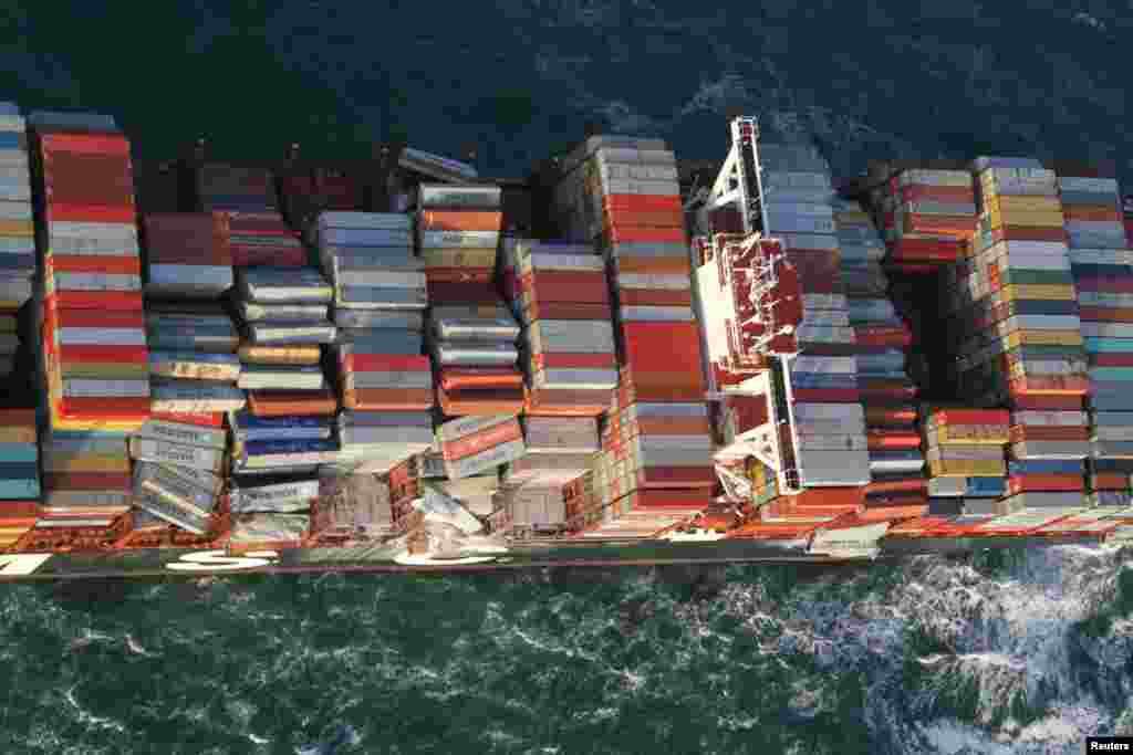 A handout aerial photo made available by the Dutch Coastguard shows the container ship MSC ZOE. Up to 270 containers had fallen off the Panamanian-flagged MSC ZOE, one of the world's biggest container ships, in rough weather near the German island of Borkum and floated southwest toward Dutch waters.