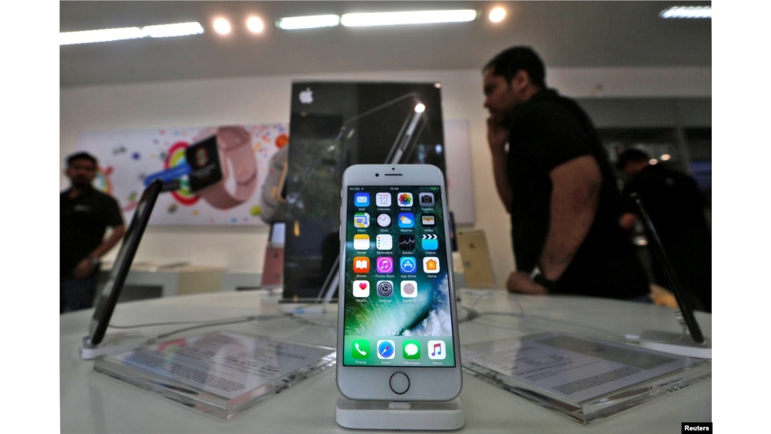An iPhone is seen on display at a kiosk at an Apple reseller store in Mumbai, India, Jan. 12, 2017.