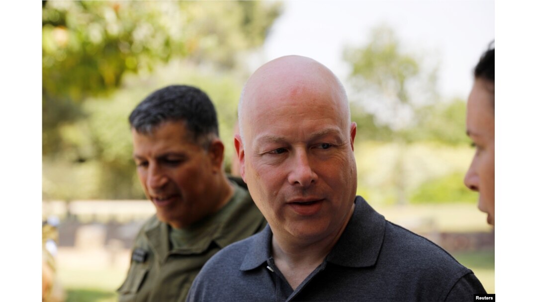 FILE - Jason Greenblatt, center, U.S. President Donald Trump's Middle East envoy, arrives to visit Kibbutz Nahal Oz, just outside the Gaza Strip, in southern Israel, Aug. 30, 2017.