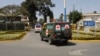 Bodies of Kenyan soldiers are transported by ambulances as they arrive at Wilson airport, Nairobi Kenya, Jan 27, 2017. A spokesman for extremist group al-Shabab says its fighters have killed at least 51 Kenyan soldiers in an attack on an army base in Kulb