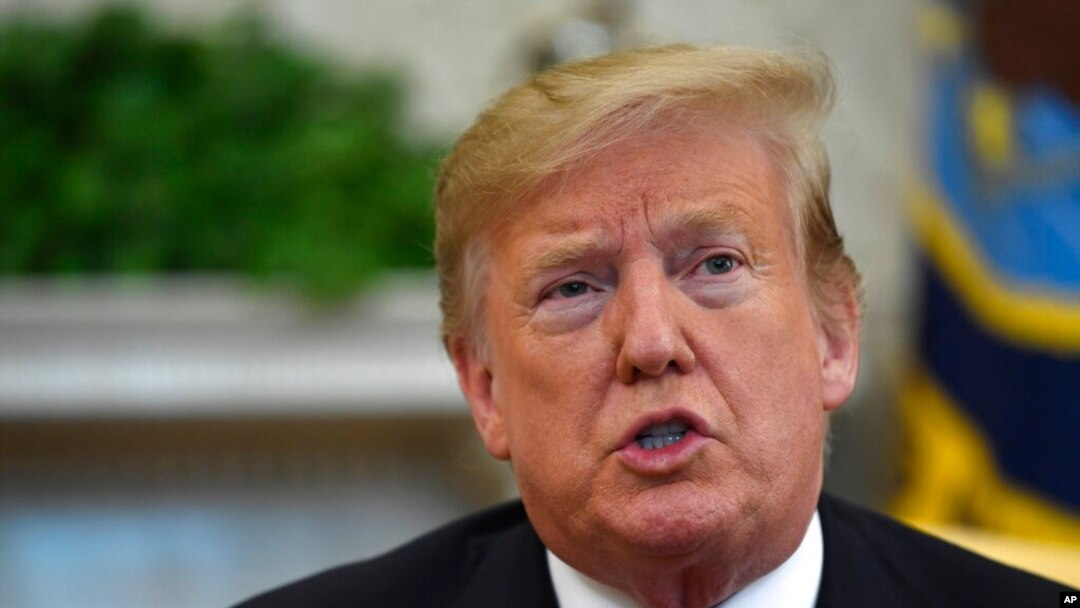 FILE - President Donald Trump speaks in the Oval Office of the White House in Washington, March 27, 2019. 