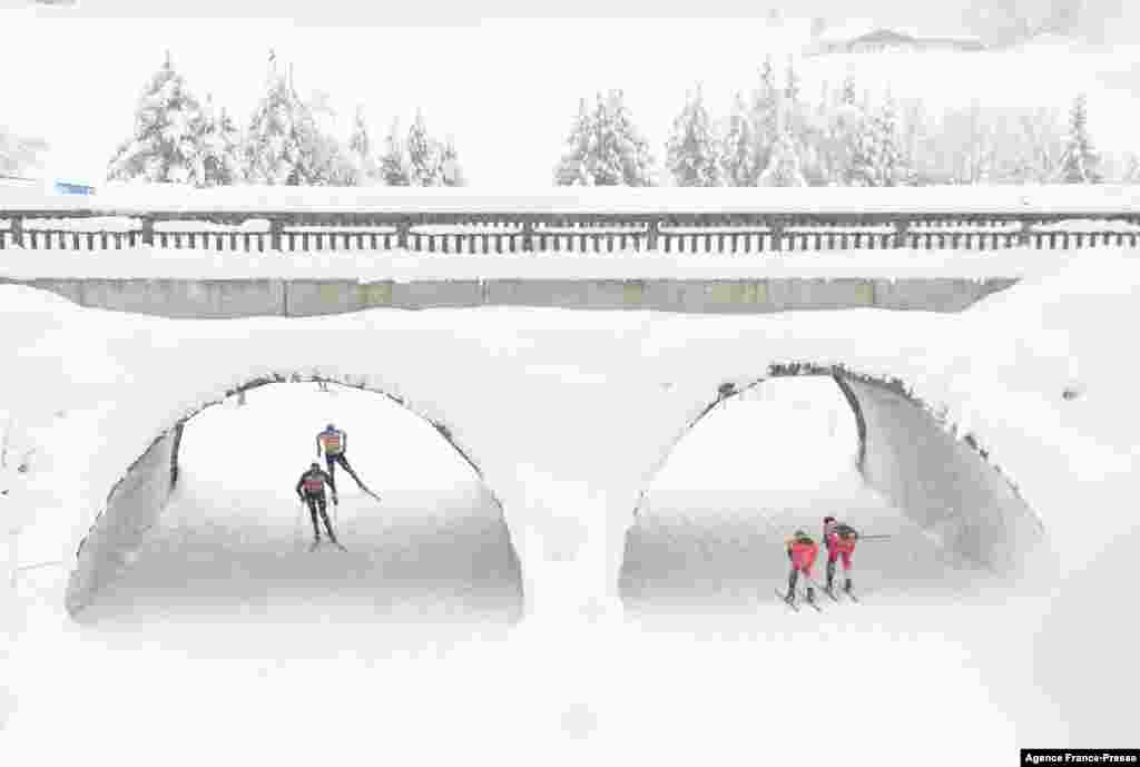 Competitors take their practice run on the eve of the IBU Biathlon World Cup in Hochfilzen, Austria.