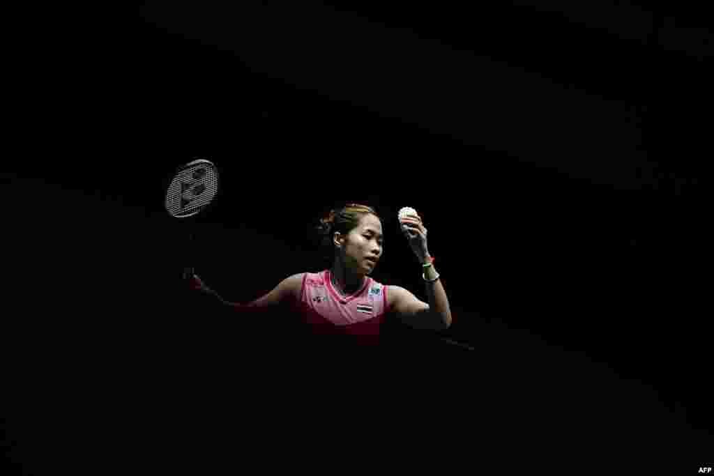 Thailand's Ratchanok Intanon prepares to serve against Zhang Beiwen of the U.S. during their women's singles match at the Malaysia Open badminton tournament in Kuala Lumpur, Malaysia.