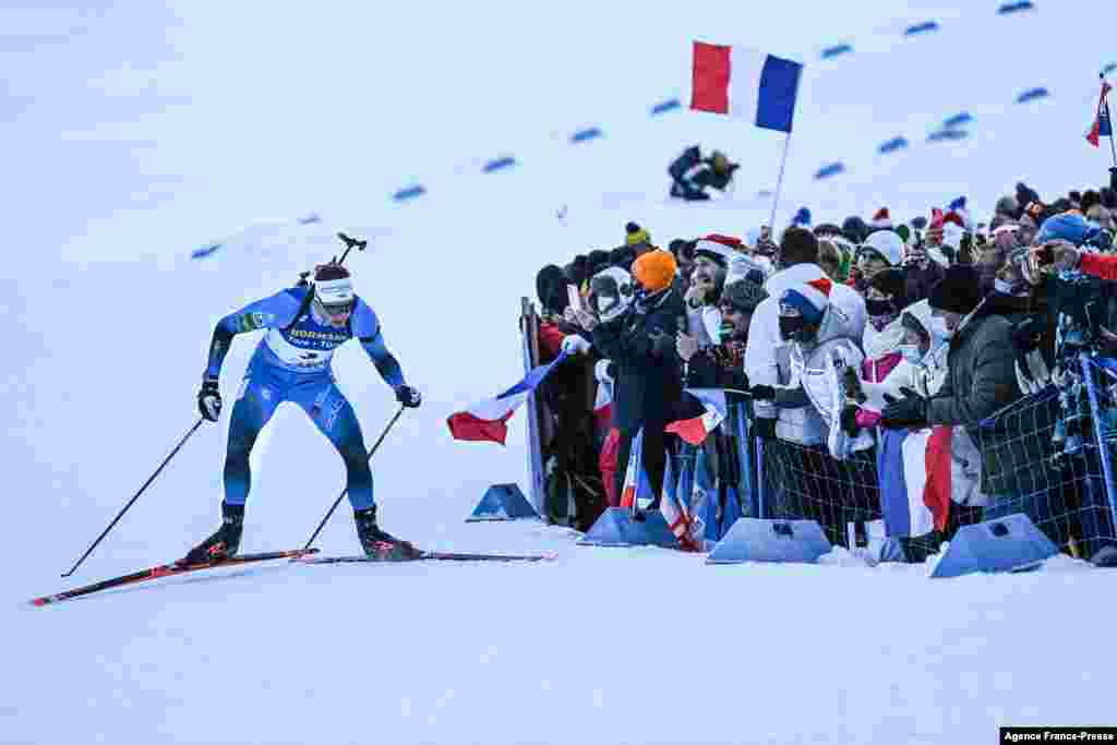 French biathlete Emilien Jacquelin competes during the Men’s 15 km Mass Start event of the IBU Biathlon World Cup in Le Grand Bornand near Annecy, France.