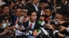 Move Forward Party Leader and prime ministerial candidate Pita Limjaroenrat speaks to the media in Thai Parliament after the parliamentary vote for the premiership in Bangkok on July 13, 2023. (Photo by Lillian SUWANRUMPHA / AFP)