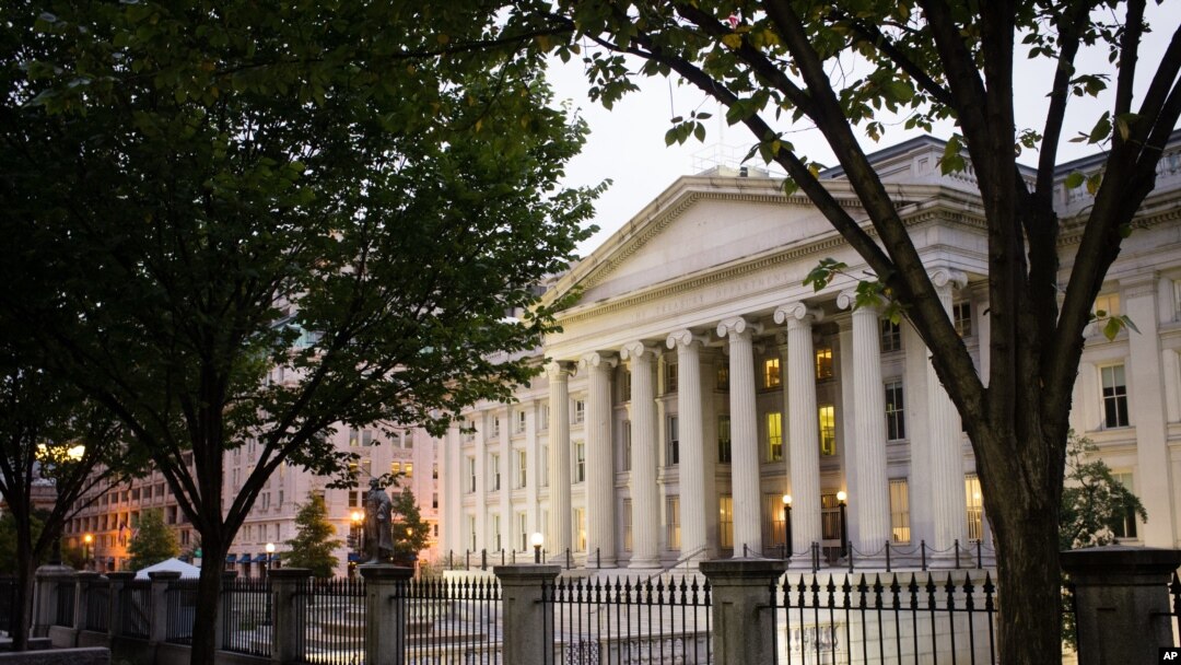 FILE - In this Wednesday, Oct. 16, 2013, file photo, the U.S. Treasury Building stands in Washington. On Friday, April 15, 2016, the Treasury Department reports on foreign holdings of U.S. debt for February. 