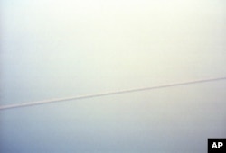 High above, you get an idea of what seems like the endless span of the Pontchartrain Causeway.
