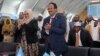 Somalia's newly elected President Mohamed Abdullahi Farmaajo and his wife Zeinab Abdi applaud during his inauguration ceremony in Somalia's capital Mogadishu, Feb. 22, 2017. 