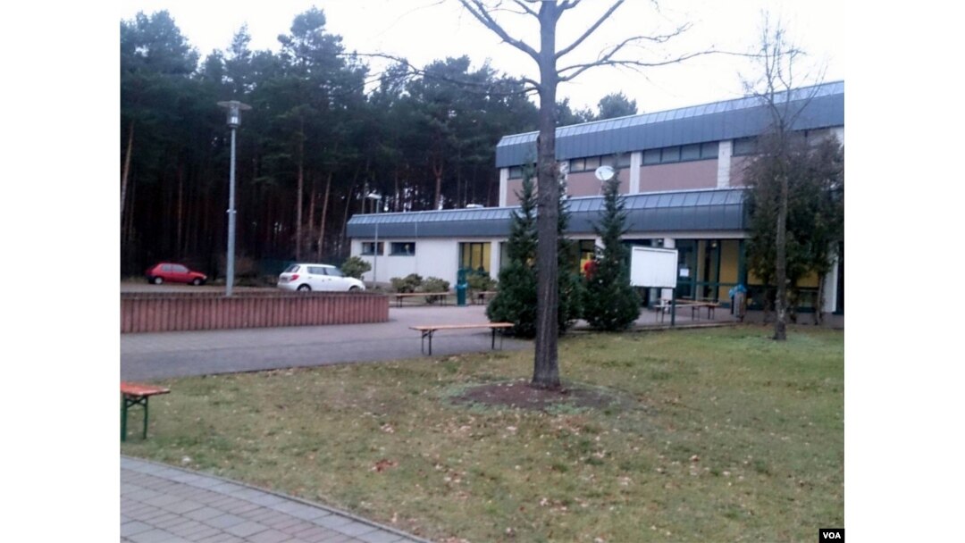 Set in the forest adjacent to a military base, refugees in this camp in Holzdorf, Germany, say they are so isolated that they really don't know if increased European terrorist alerts has sparked xenophobia, Nov. 28, 2015. (VOA News)