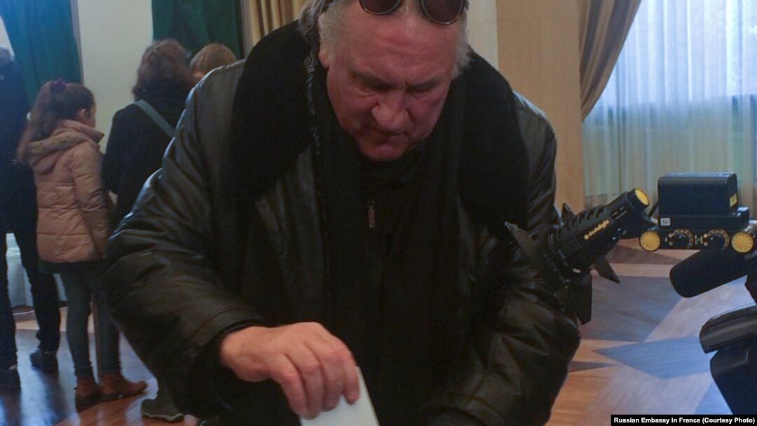 Gerard Depardieu votes at the Embassy of Russia in Paris, France, March 18, 2018 in this picture obtained from social media. 