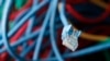 FILE - An internet cable is seen in a server room.