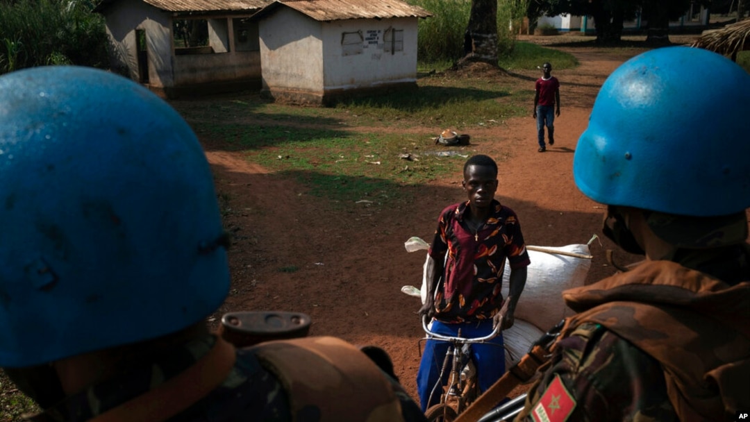 FILE - U.N. peacekeepers patrol the town of Bangassou, Central African Republic, Feb. 15, 2021. 