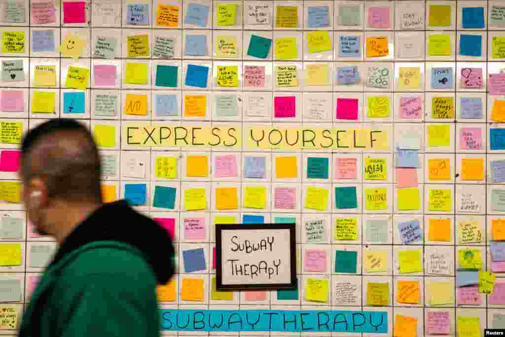Messages written on Post-it notes are displayed in the Union Sq subway station in New York City, Nov. 7, 2018.