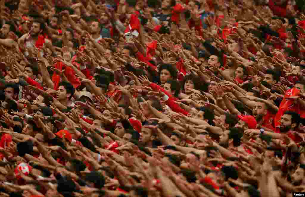 Soccer fans cheer during the quarter final second leg between Al-Ahly v Mamelodi Sundowns in the African Champions League at the Borg El Arab Stadium in Alexandria, Egypt, April 13, 2019.