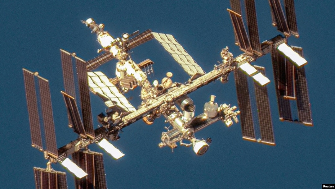 FILE - A satellite image shows an overview of the International Space Station with the Boeing Starliner spacecraft, June 7, 2024. (Maxar Technologies/Handout via REUTERS)