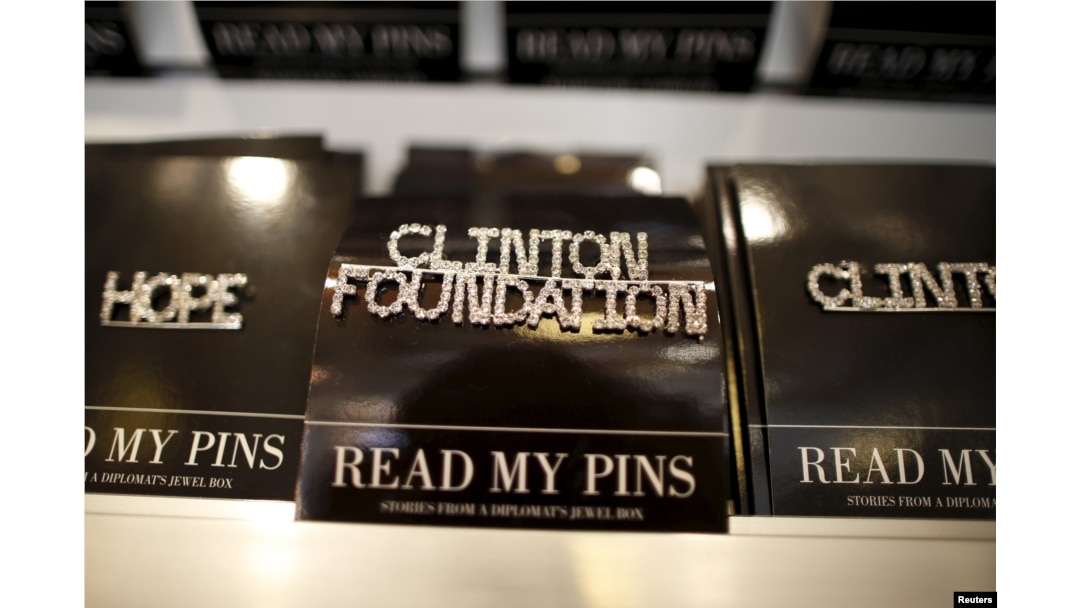 FILE - A Clinton Foundation brooch is seen for sale at the Clinton Museum Store in Little Rock, Arkansas, United States April 27, 2015. The Clinton Foundation's acting chief executive admitted on Sunday that the charity had made mistakes on how it listed