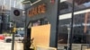 The Lapats Thai Noodle Bar is boarded up with plywood after being damaged from the explosion in Tenderloin, San Francisco, CA