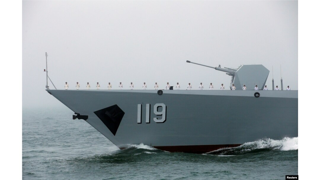 FILE - The Chinese navy’s guided missile destroyer Guiyang takes part in a naval parade off the eastern port city of Qingdao, April 23, 2019.