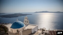 FILE - A general view of village of Fira on the Greek island of Santorini on July 19, 2024.