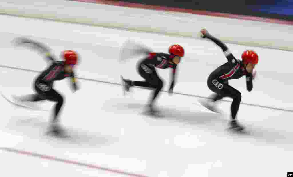 Chinese women's team competes during the ISU single distance Speedskating World Championships in Inzell, Germany.