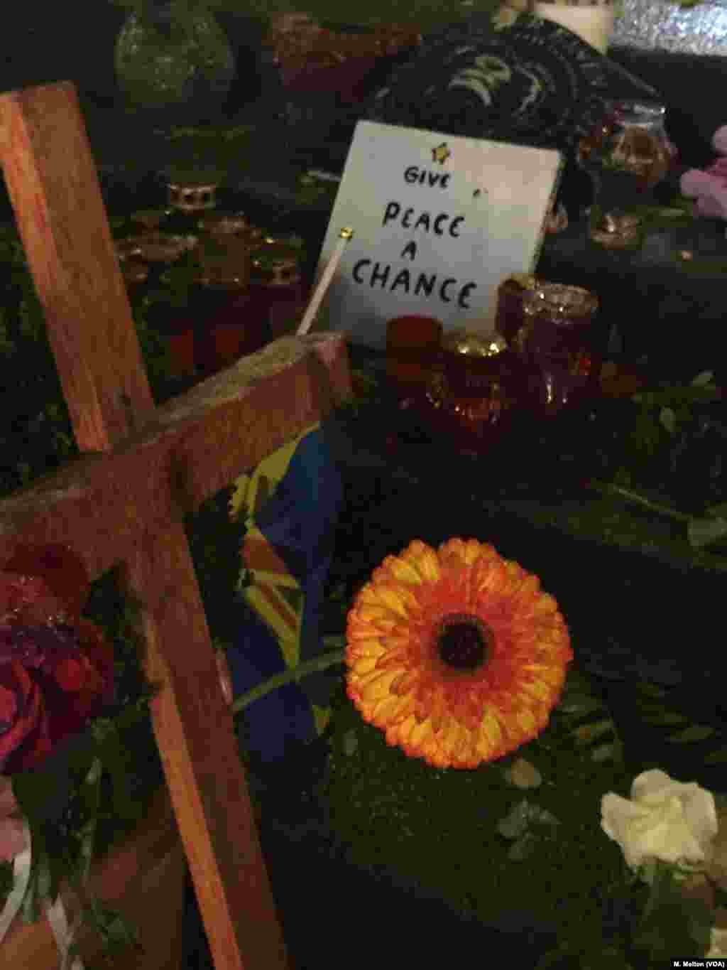 City officials say they will close the Breitscheidplatz market on the anniversary of the attack, December 19, for a memorial service. On that date, they also plan to unveil a permanent memorial: a bronze crack in the sidewalk with the victims' names inscribed nearby.