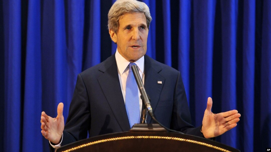 U.S. Secretary of State John Kerry speaks during a press conference at Queen Alia International Airport, July 19, 2013. Kerry says Israel and the Palestinians will meet soon in Washington to finalize an agreement on relaunching peace negotiations for the 