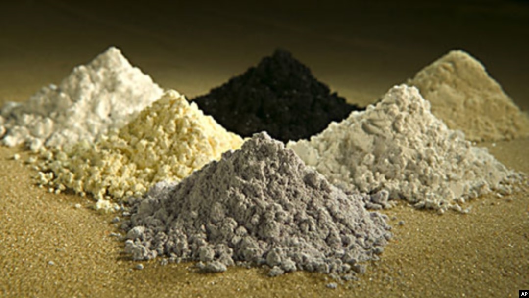 Rare earth oxides from top center clockwise: praseodymium, cerium, lanthanum, neodymium, samarium, and gadolinium