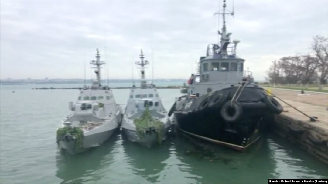Ukrainian ships detained in Kerch Strait Sunday are docked in this image from video released by Russian Federal Security Service, Nov. 27, 2018.